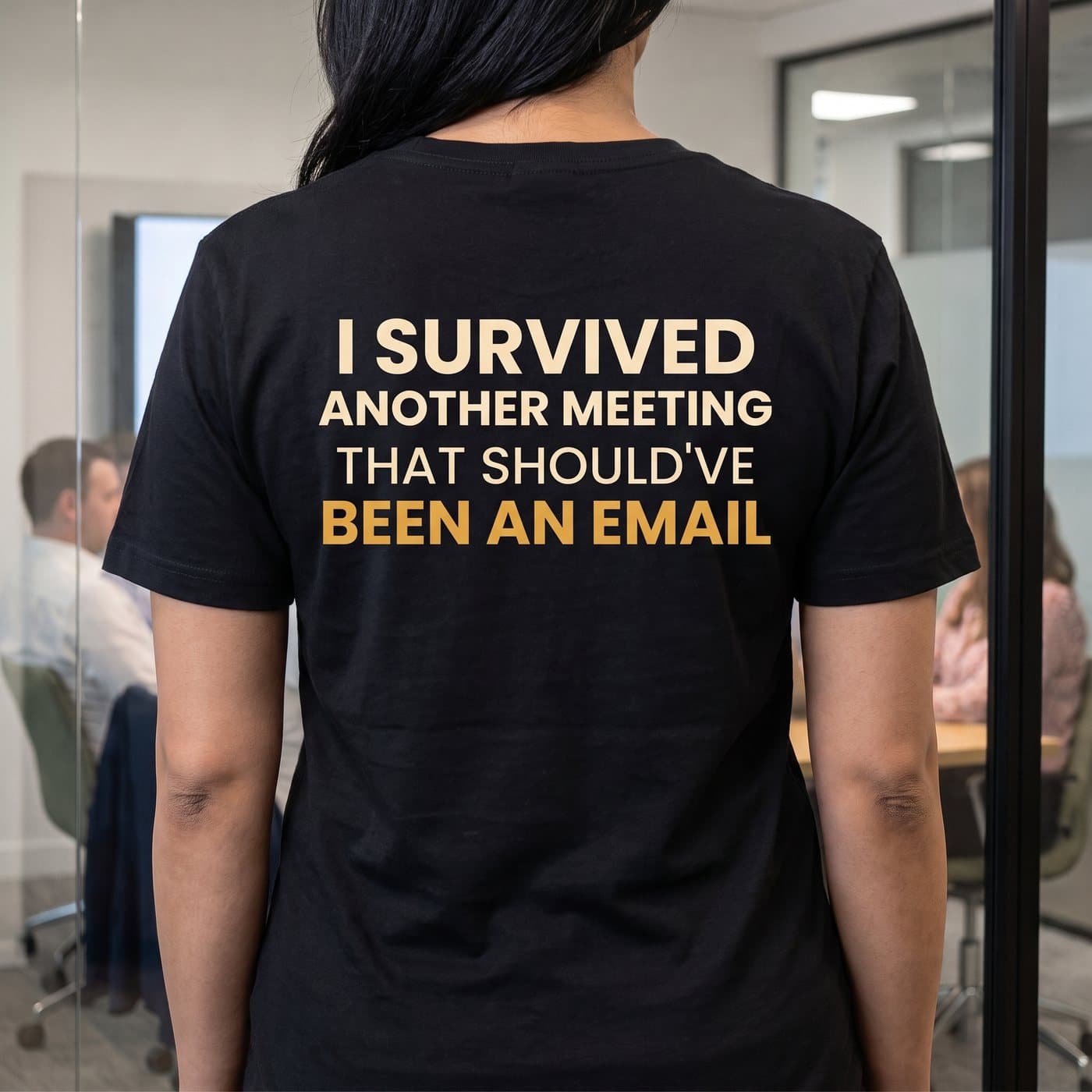 I Survived Another Meeting That Should've Been An Email t-shirt in Black, close-up of the print on the back