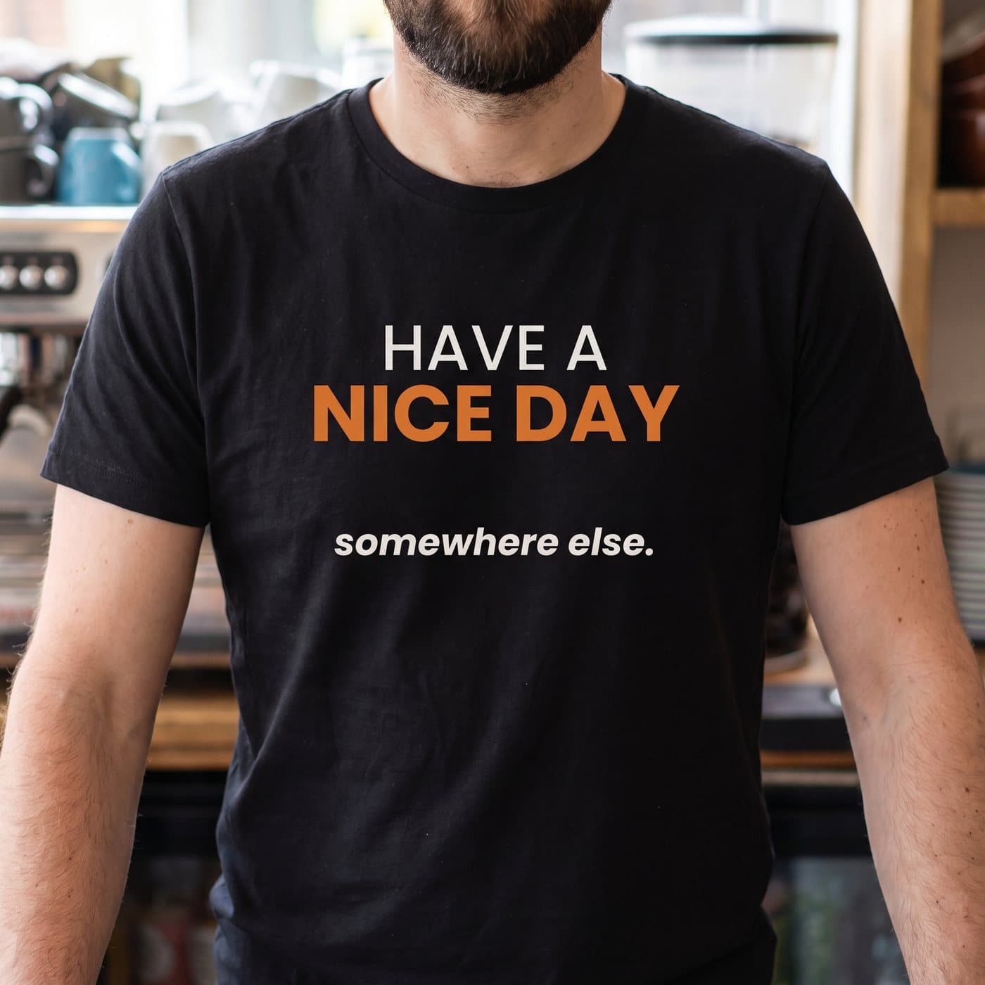 Have A Nice Day... Somewhere Else t-shirt in Black, close-up of the print